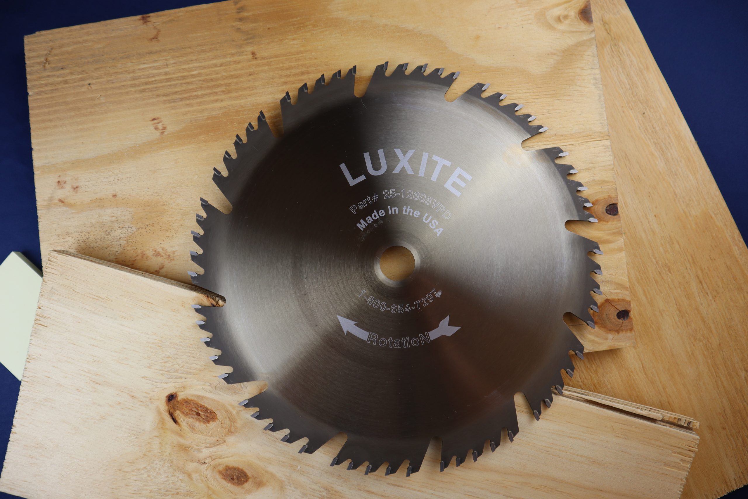 Saw blade with sheets of plywood